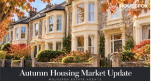 Bay-fronted houses framed by autumn foliage with House Fox Estate Agents branding.